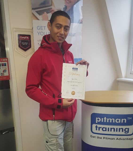 Oliver achieves his Graphic Design Diploma from Pitman Training Reading
