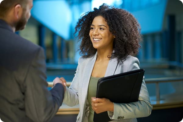 Apprenticeships help businesses recruit and develop talent Employer meeting candidate for business administrator apprenticeship role